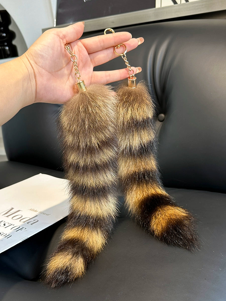 American raccoon dog raccoon tail key pendant jewelry electric car car keychain pendant plush bag pendant