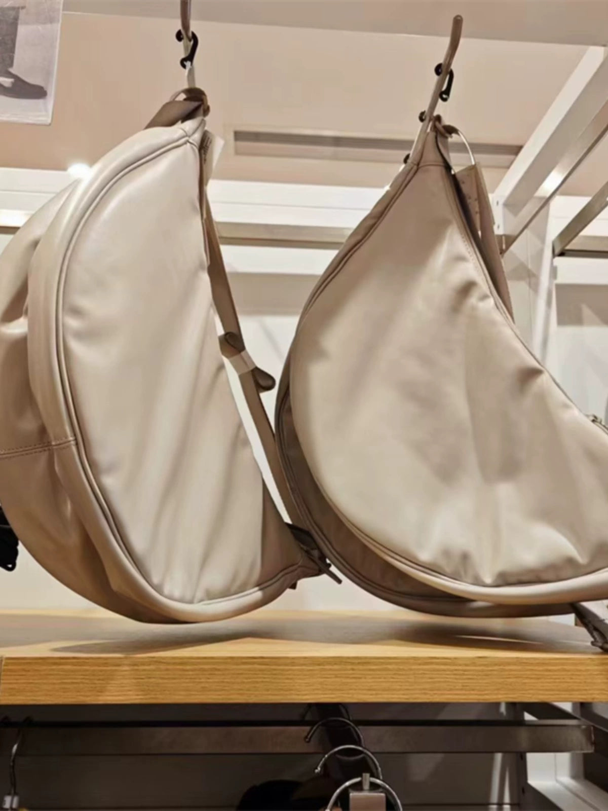 Men's and women's adjustable handbags, dumpling bags, shoulder bags, imitation leather curved shoulder backpacks, messenger bags.