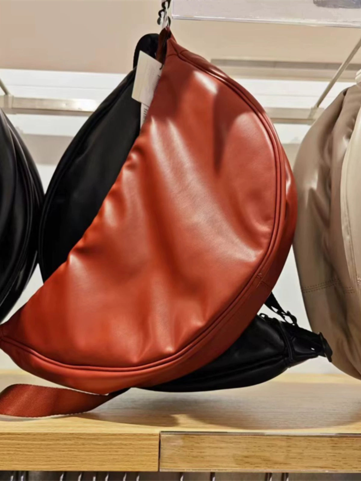 Men's and women's adjustable handbags, dumpling bags, shoulder bags, imitation leather curved shoulder backpacks, messenger bags.