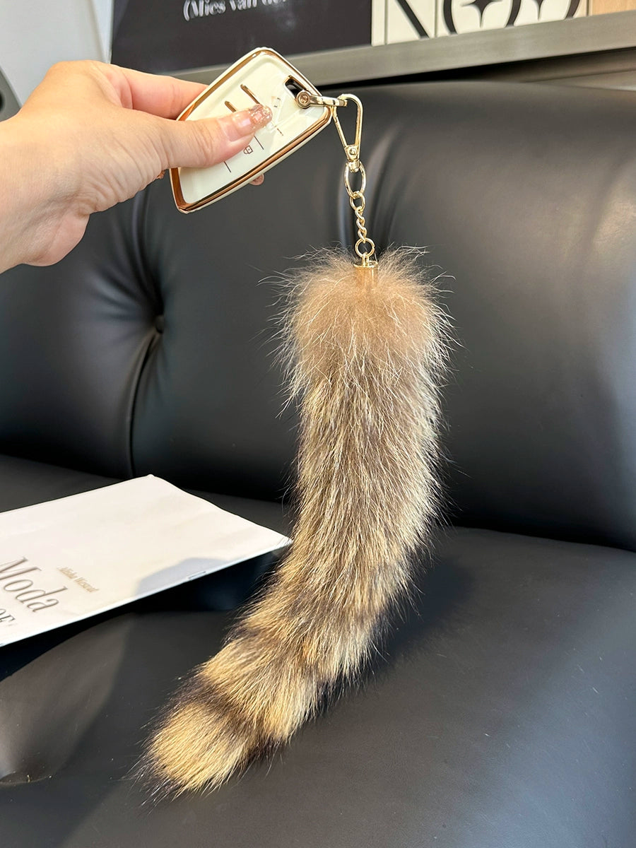 American raccoon dog raccoon tail key pendant jewelry electric car car keychain pendant plush bag pendant