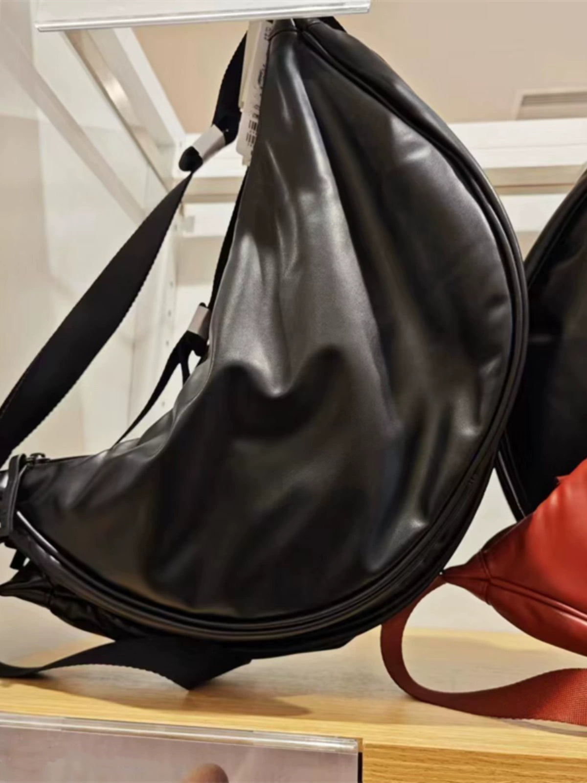 Men's and women's adjustable handbags, dumpling bags, shoulder bags, imitation leather curved shoulder backpacks, messenger bags.