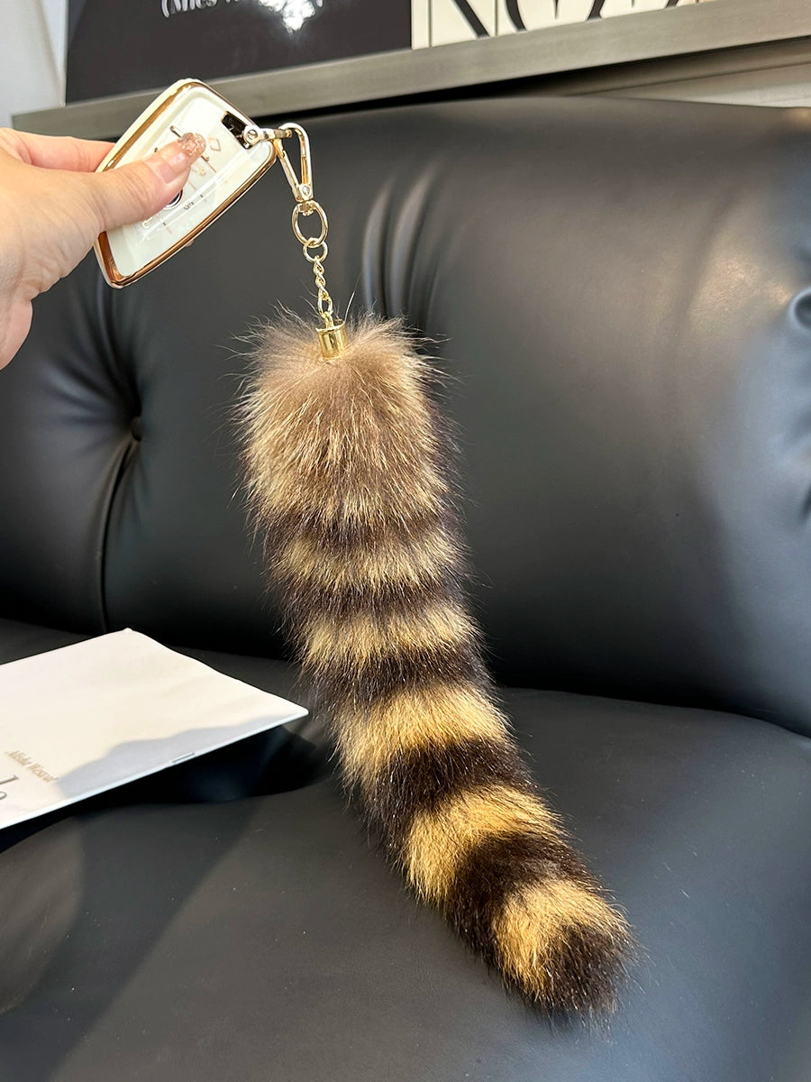 American raccoon dog raccoon tail key pendant jewelry electric car car keychain pendant plush bag pendant
